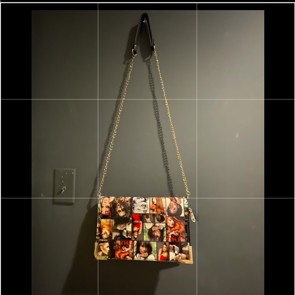 Wallet with photo print, with a small stain on the back.